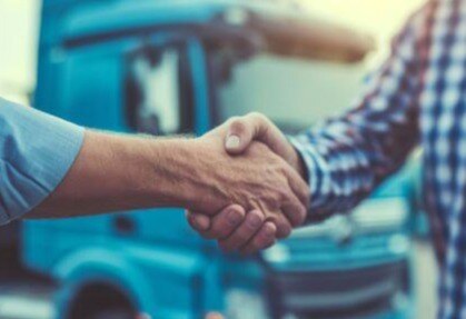 accountant shaking a truckers hand-Dec-11-2024-05-55-22-0989-PM
